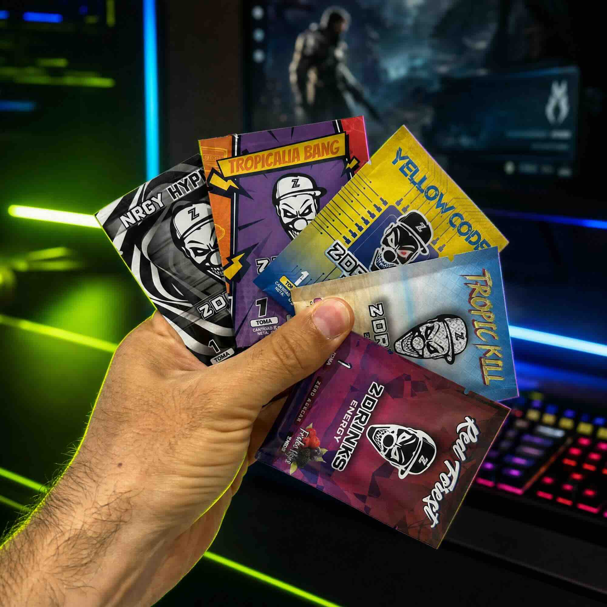 Z Drinks abanico de muestras — todos los sobres en abanico, colores y sabores de la gama Energy / Z Drinks sample fan layout — all sachets fanned out, colors and flavors of the Energy range